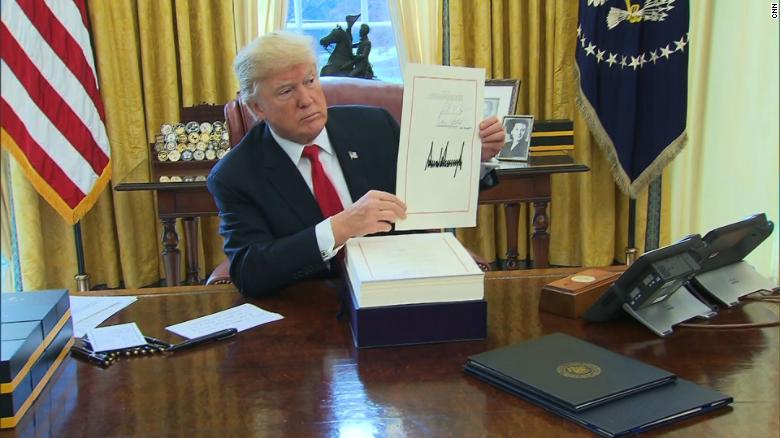 Trump signs tax bill